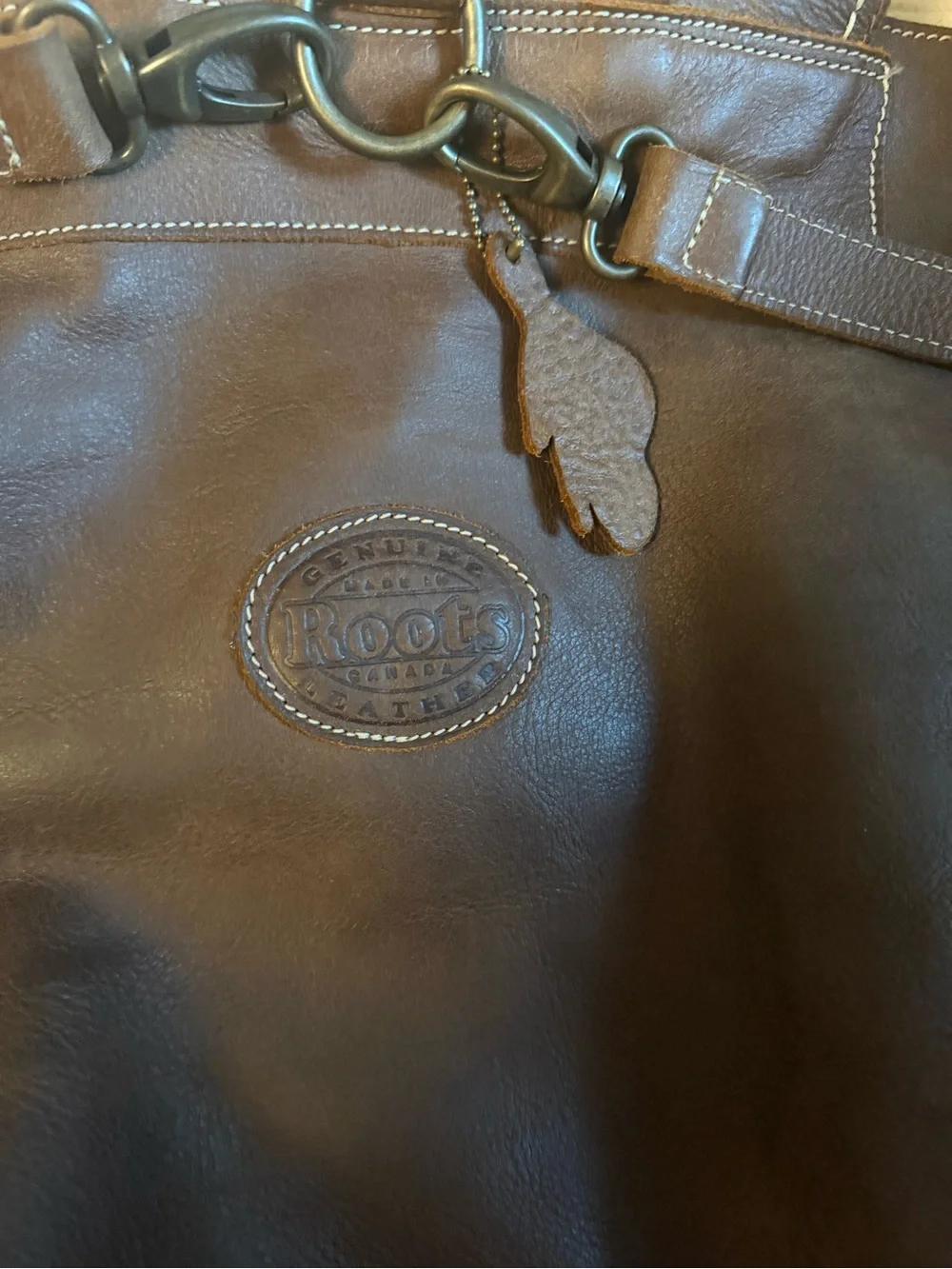 Roots Dark Brown Leather Backpack with Drawstring & Buckle